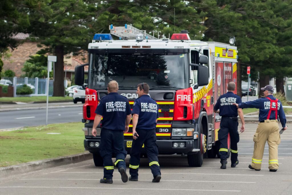 New firefighters walking back to their firetruck