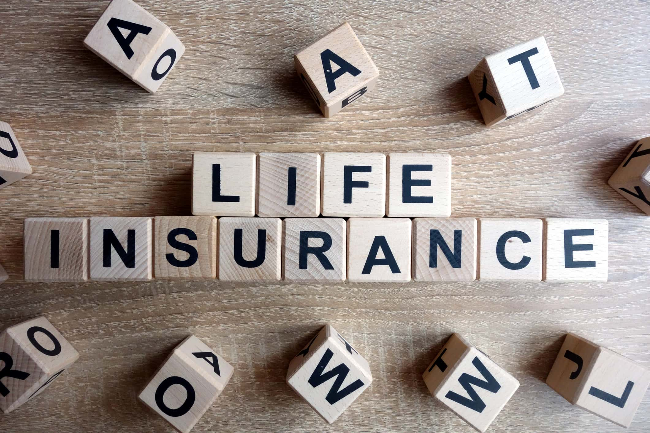 Blocks of wood with letters that spell out life insurance