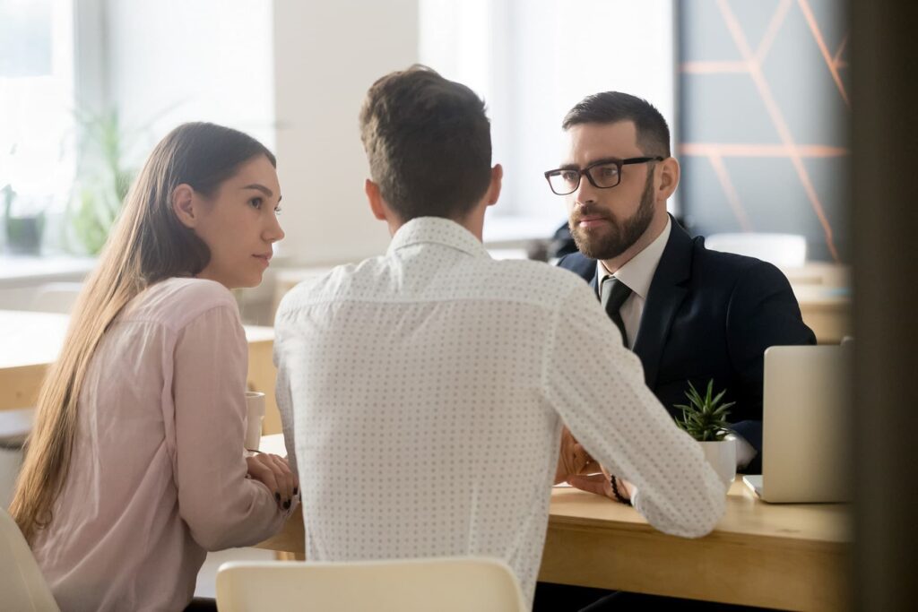 Lawyer prepping client for compulsory conference