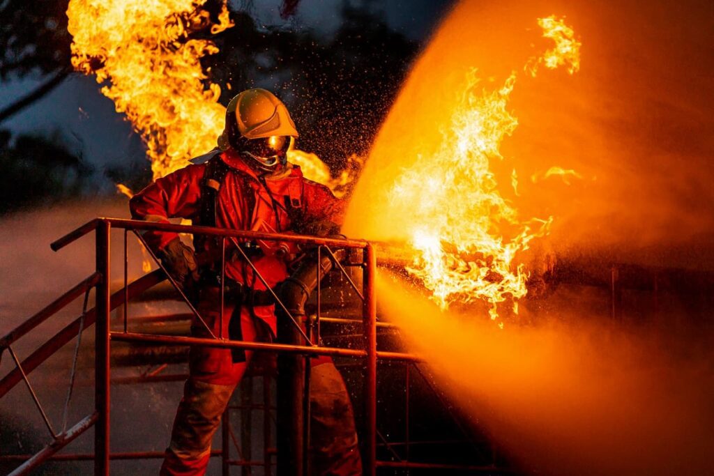 Firefighter fighting chemical fire