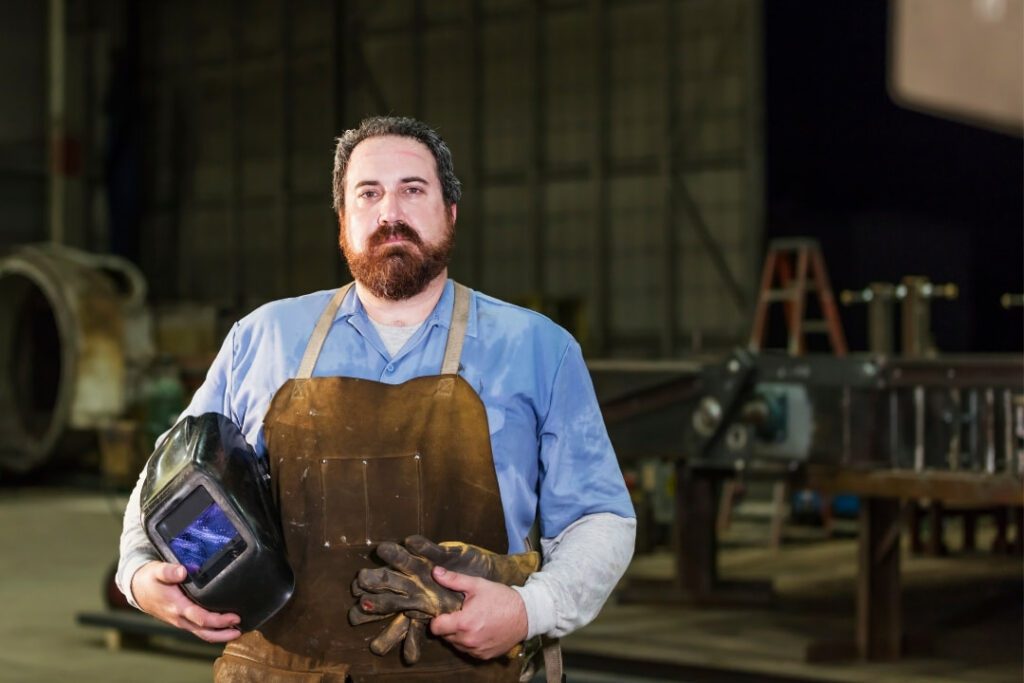 Unhappy male welder