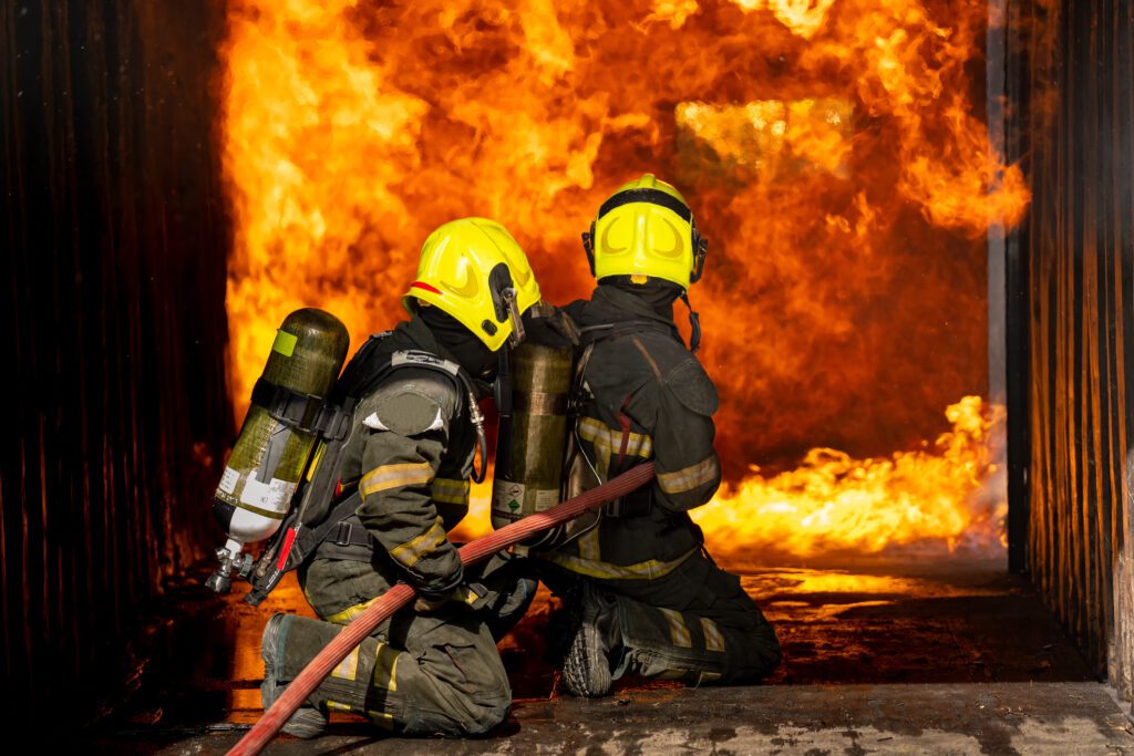 Firefighters fighting a fire that was caused by toxic fume